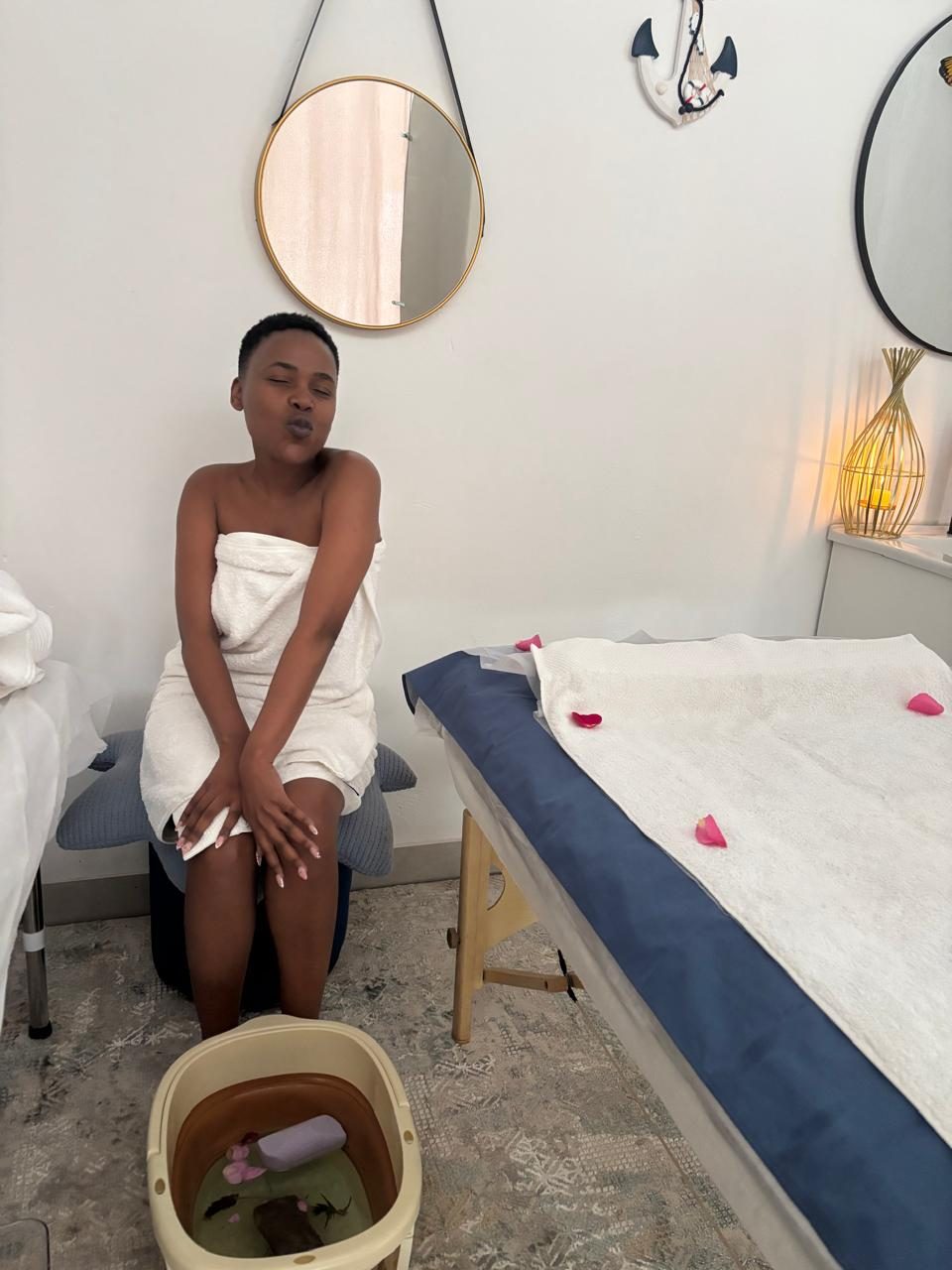 A client wrapped in a towel before treatment begins
